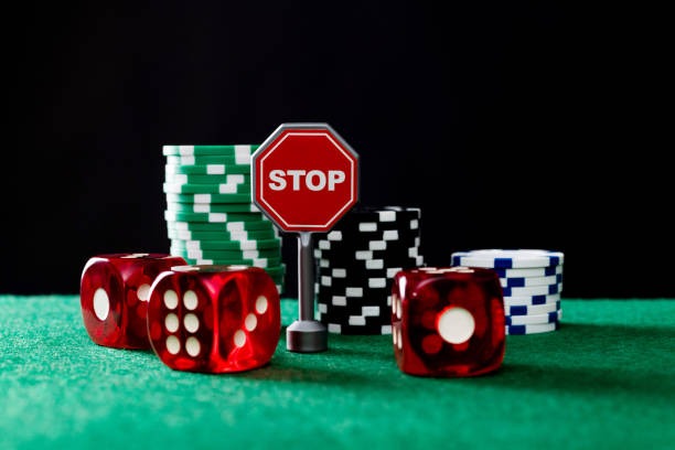 Live dealer conducting Dragon Fishing game with card positions on table layout