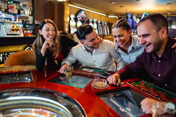 Grand Slam roulette table with live dealer spinning and player betting interface